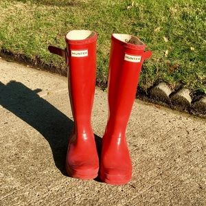 Glossy Red Hunter rain boots.